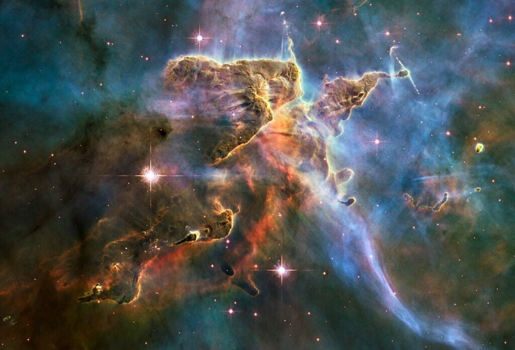 The NASA/ESA Hubble Space Telescope captured this billowing cloud of cold interstellar gas and dust rising from a tempestuous stellar nursery located in the Carina Nebula, 7500 light-years away in the southern constellation of Carina.