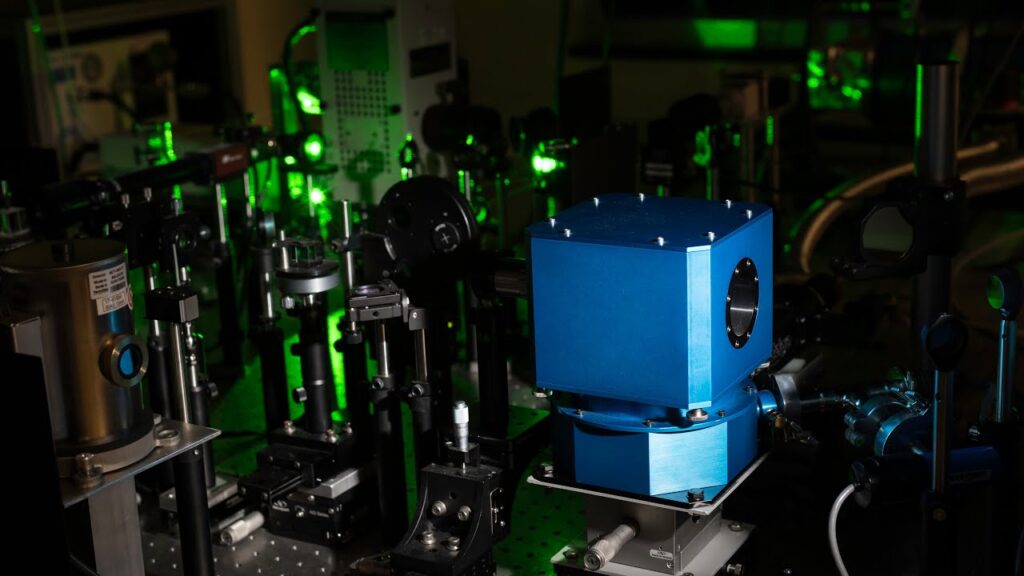 Record-breaking room temperature superconductivity setup using diamond anvil cell and laser lights.