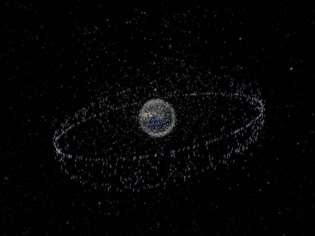 Space junk in the orbits of the earth.